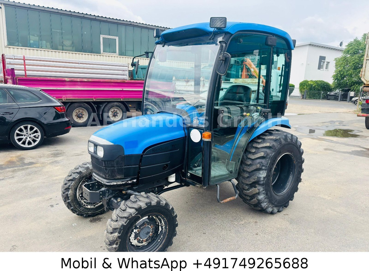 New Holland TC22D Compact Tractor *1500Std./StraßenZulassung - Tracteur agricole: photos 1 New Holland TC22D Compact Tractor *1500Std./StraßenZulassung - Tracteur agricole: photos 1