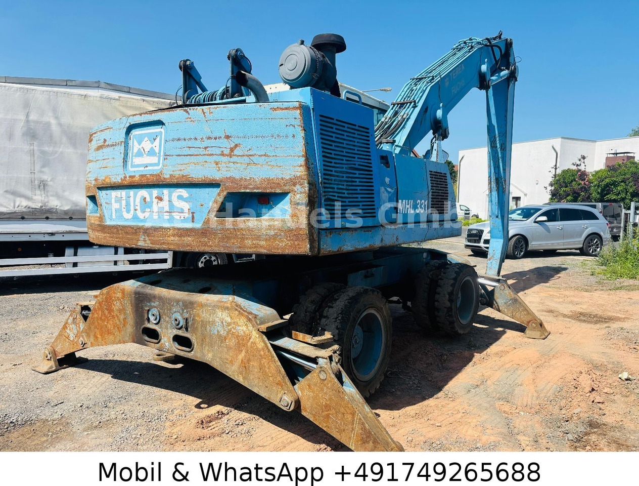 Terex MHL 331 Umschlagbagger - Pelle sur pneus: photos 3 Terex MHL 331 Umschlagbagger - Pelle sur pneus: photos 3