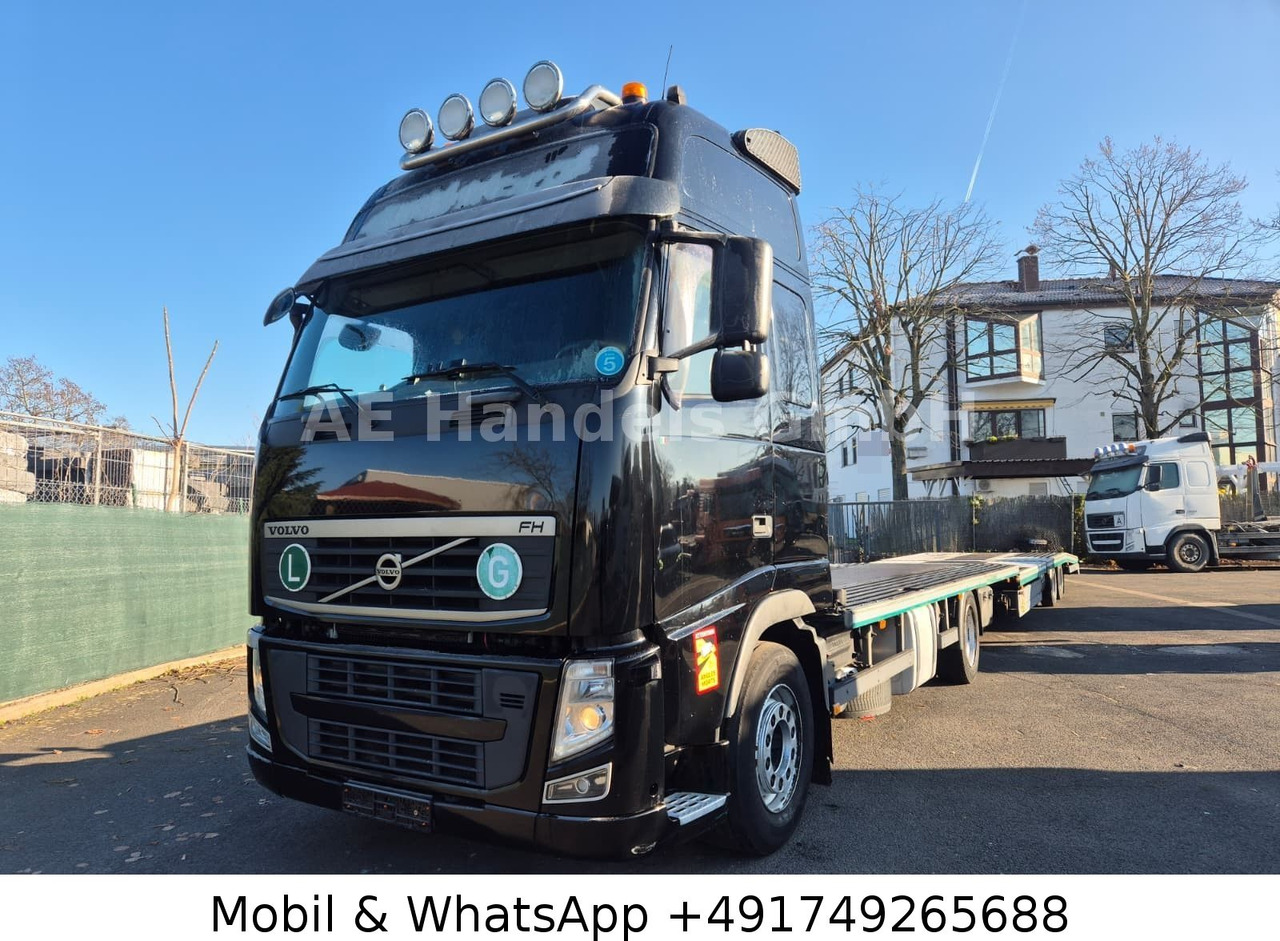 Volvo FH 13 GlobeTrotter XL LL *VEB+/Seilwinde/2xTank - Camion porte-voitures: photos 1 Volvo FH 13 GlobeTrotter XL LL *VEB+/Seilwinde/2xTank - Camion porte-voitures: photos 1