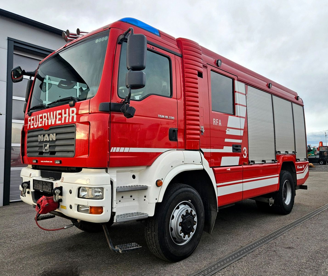 MAN TGM 18.330 4x4 Feuerwehr Rosenbauer RFA - Camion: photos 1 MAN TGM 18.330 4x4 Feuerwehr Rosenbauer RFA - Camion: photos 1