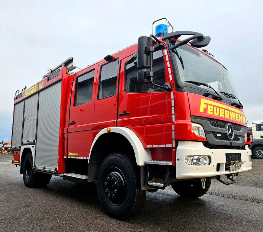 Mercedes-Benz Atego 1529 4x4 Feuerwehr Schlingmann LF20 - Camion: photos 1 Mercedes-Benz Atego 1529 4x4 Feuerwehr Schlingmann LF20 - Camion: photos 1