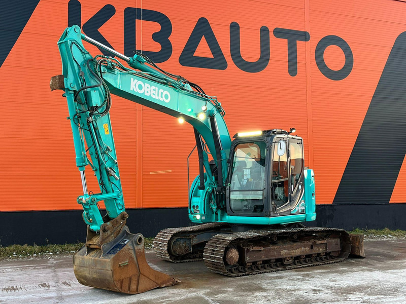 Kobelco SK 140 SRLC-5 AC / CENTRAL LUBRICATION - Pelle sur chenille: photos 1 Kobelco SK 140 SRLC-5 AC / CENTRAL LUBRICATION - Pelle sur chenille: photos 1