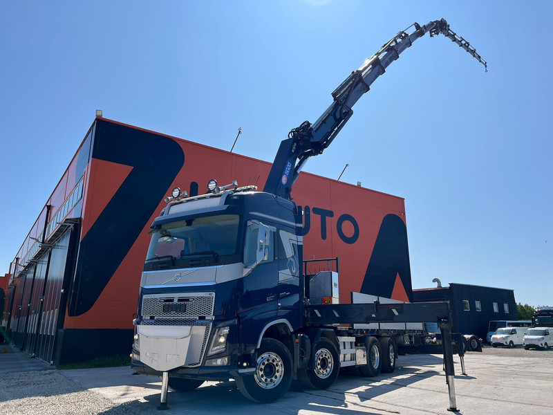 Volvo FH 16 650 8x2*6 HMF 6020K-RC + JIB / PLATFORM L=6344 mm - Camion plateau, Camion grue: photos 1 Volvo FH 16 650 8x2*6 HMF 6020K-RC + JIB / PLATFORM L=6344 mm - Camion plateau, Camion grue: photos 1