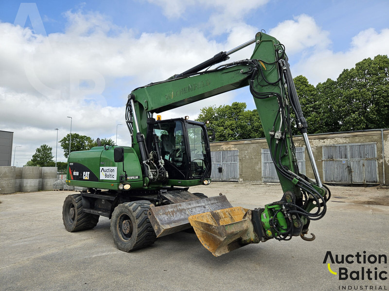Caterpillar M315D - Pelle sur pneus: photos 1 Caterpillar M315D - Pelle sur pneus: photos 1
