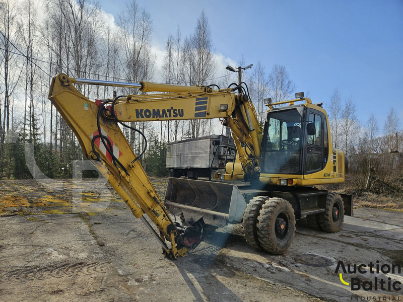 Komatsu PW130ES-6K - Pelle sur pneus: photos 1 Komatsu PW130ES-6K - Pelle sur pneus: photos 1
