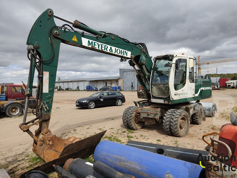 Liebherr A 900 C Litronic - Pelle sur pneus: photos 1 Liebherr A 900 C Litronic - Pelle sur pneus: photos 1