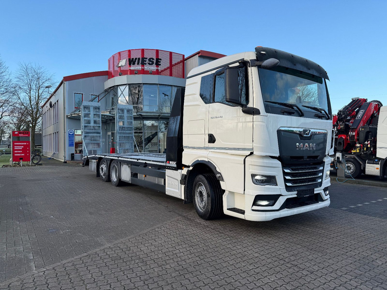 MAN Baumaschinen- Arbeitsbühnentransporter Rampen - Camion porte-voitures: photos 2 MAN Baumaschinen- Arbeitsbühnentransporter Rampen - Camion porte-voitures: photos 2