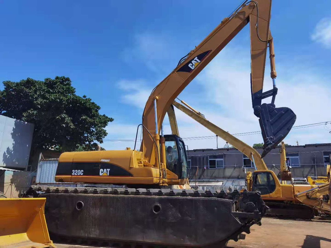 CATERPILLAR 320C - Excavatrice amphibie: photos 1 CATERPILLAR 320C - Excavatrice amphibie: photos 1