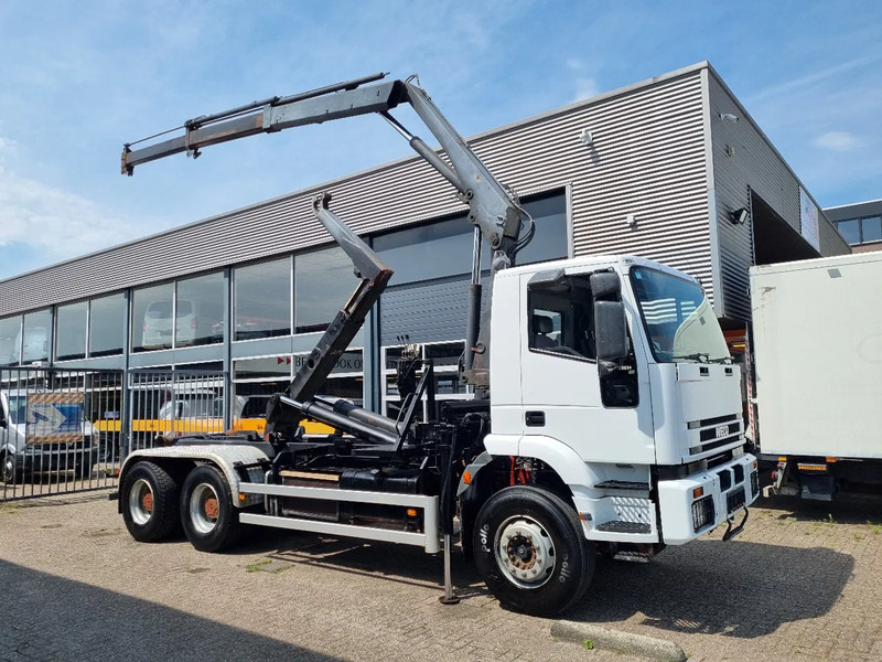 Iveco Eurotrakker 6X4 CURSOR 480 PK 20T HOOKLIFT 10.4 TM HIAB CRANE - Camion ampliroll, Camion grue: photos 1 Iveco Eurotrakker 6X4 CURSOR 480 PK 20T HOOKLIFT 10.4 TM HIAB CRANE - Camion ampliroll, Camion grue: photos 1