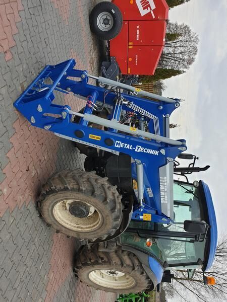 Metal-Technik für NEW HOLLAND TL 90 - Chargeur frontal pour tracteur: photos 1 Metal-Technik für NEW HOLLAND TL 90 - Chargeur frontal pour tracteur: photos 1