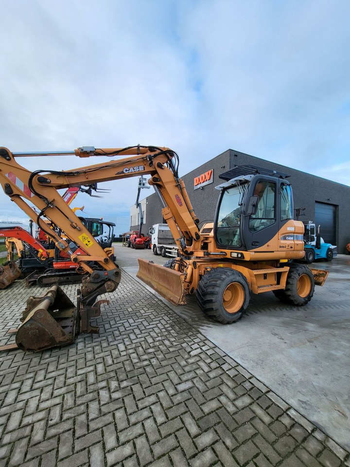 Case WX125 - Pelle sur pneus: photos 1 Case WX125 - Pelle sur pneus: photos 1