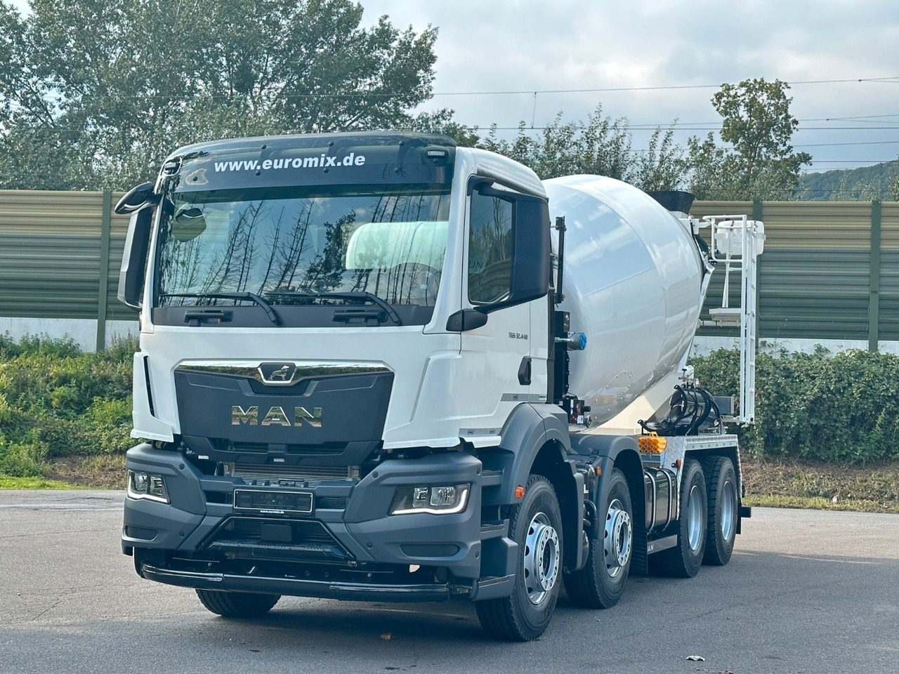 MAN TGS 32.440 8x4 / Euromix MTP EM 9 L - Camion malaxeur: photos 2 MAN TGS 32.440 8x4 / Euromix MTP EM 9 L - Camion malaxeur: photos 2