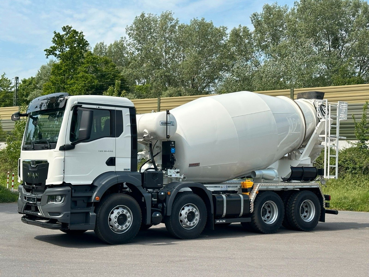 MAN TGS 32.440 8x4 / Euromix MTP EM 9 L - Camion malaxeur: photos 3 MAN TGS 32.440 8x4 / Euromix MTP EM 9 L - Camion malaxeur: photos 3