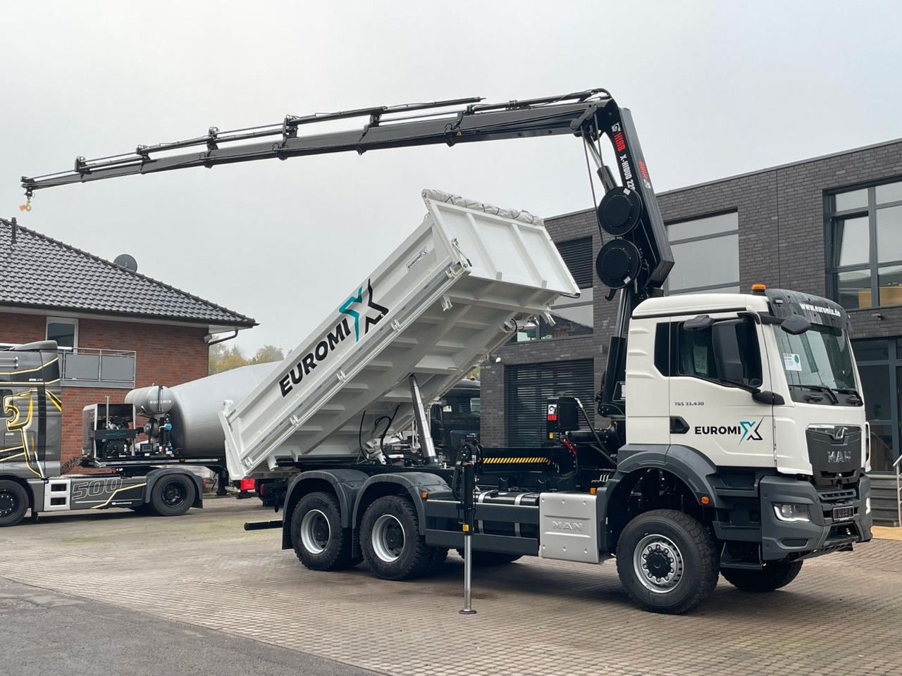 MAN TGS 33.440 6x6 /3-Seiten- Kipper / HIAB 228-6 - Camion benne, Camion grue: photos 1 MAN TGS 33.440 6x6 /3-Seiten- Kipper / HIAB 228-6 - Camion benne, Camion grue: photos 1