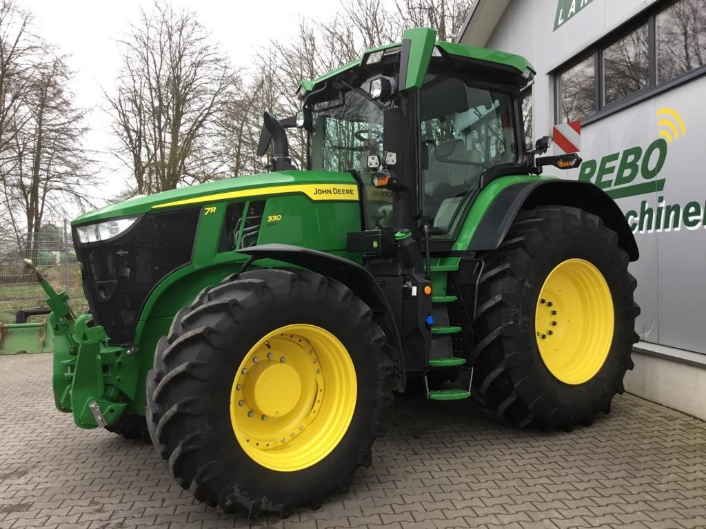 John Deere TRAKTOR 7R330 - Tracteur agricole: photos 1 John Deere TRAKTOR 7R330 - Tracteur agricole: photos 1