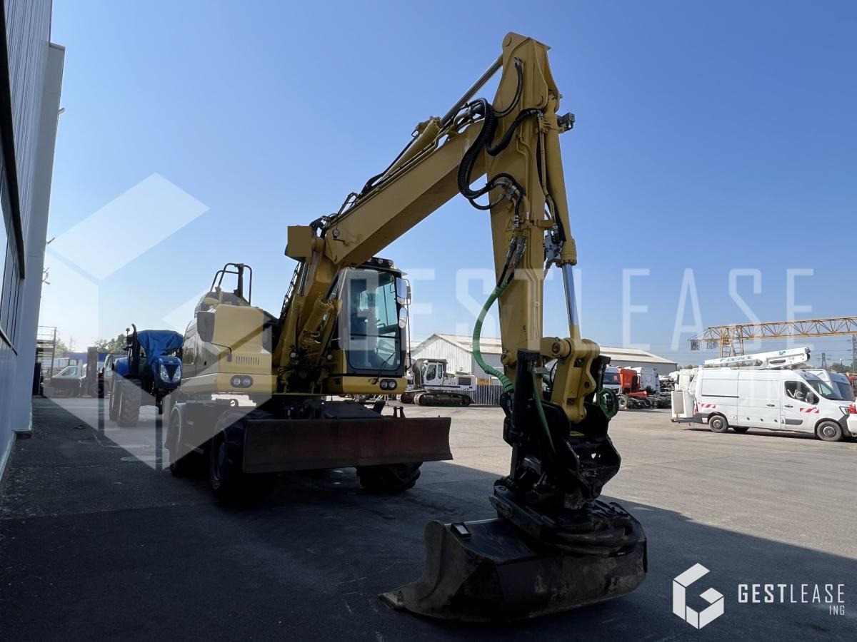 Komatsu PW148-11 - Pelle sur pneus: photos 4 Komatsu PW148-11 - Pelle sur pneus: photos 4