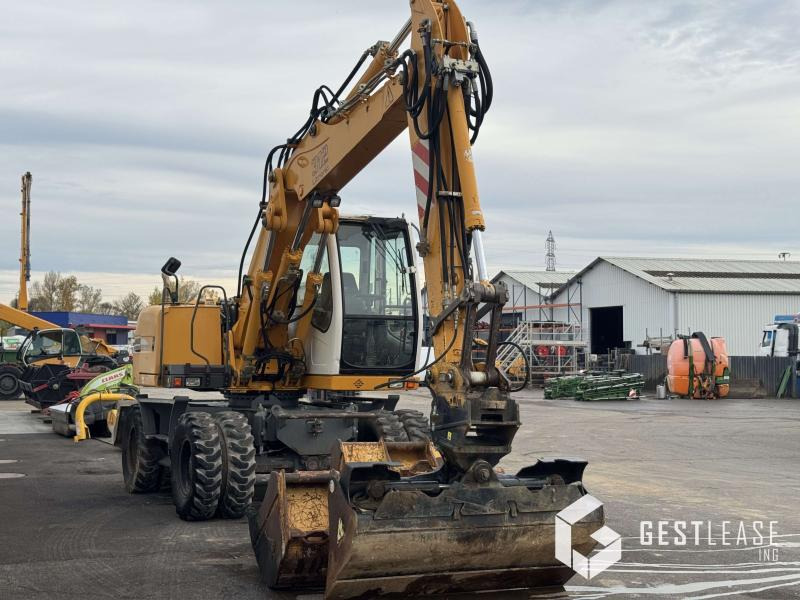 Liebherr A312 Litronic - Pelle sur pneus: photos 4 Liebherr A312 Litronic - Pelle sur pneus: photos 4