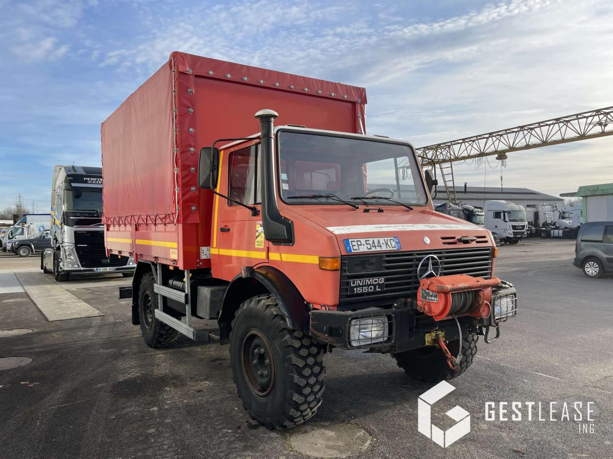 Mercedes UNIMOG 1550 L - Camion à rideaux coulissants: photos 4 Mercedes UNIMOG 1550 L - Camion à rideaux coulissants: photos 4