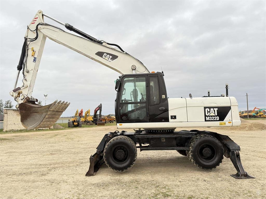 CAT M 322 D , 3D Trimble ready - Pelle sur pneus: photos 1 CAT M 322 D , 3D Trimble ready - Pelle sur pneus: photos 1