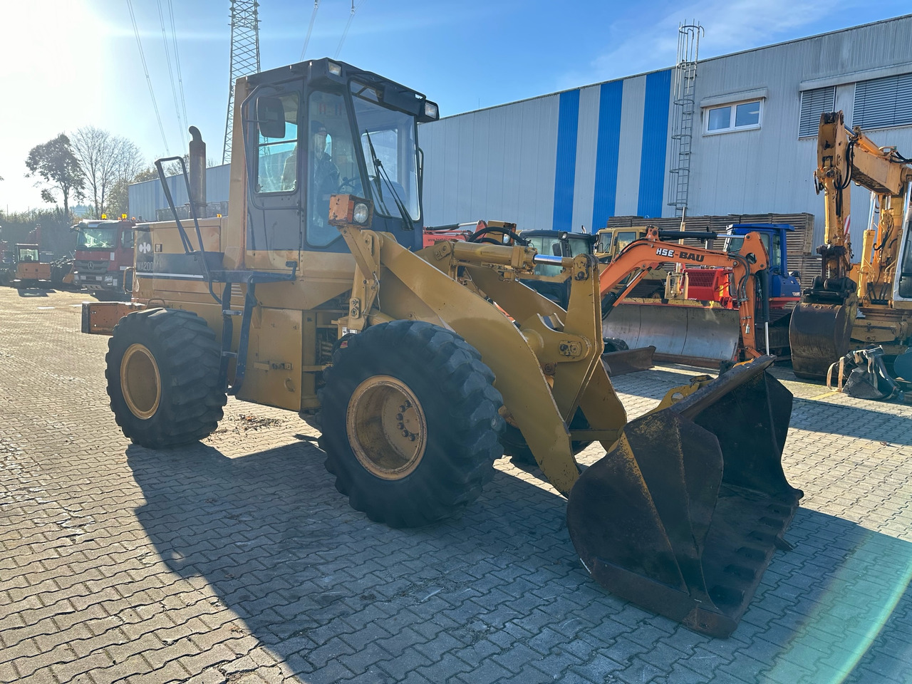 Komatsu WA200 Radlader - Chargeuse sur pneus: photos 3 Komatsu WA200 Radlader - Chargeuse sur pneus: photos 3