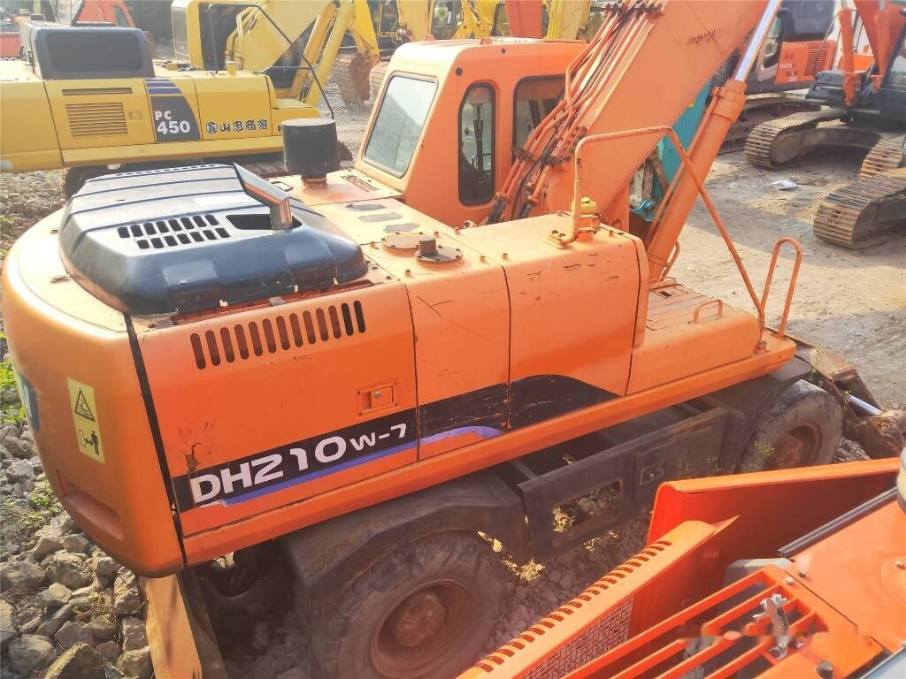 Doosan DH 210 W-7 - Pelle sur pneus: photos 3 Doosan DH 210 W-7 - Pelle sur pneus: photos 3
