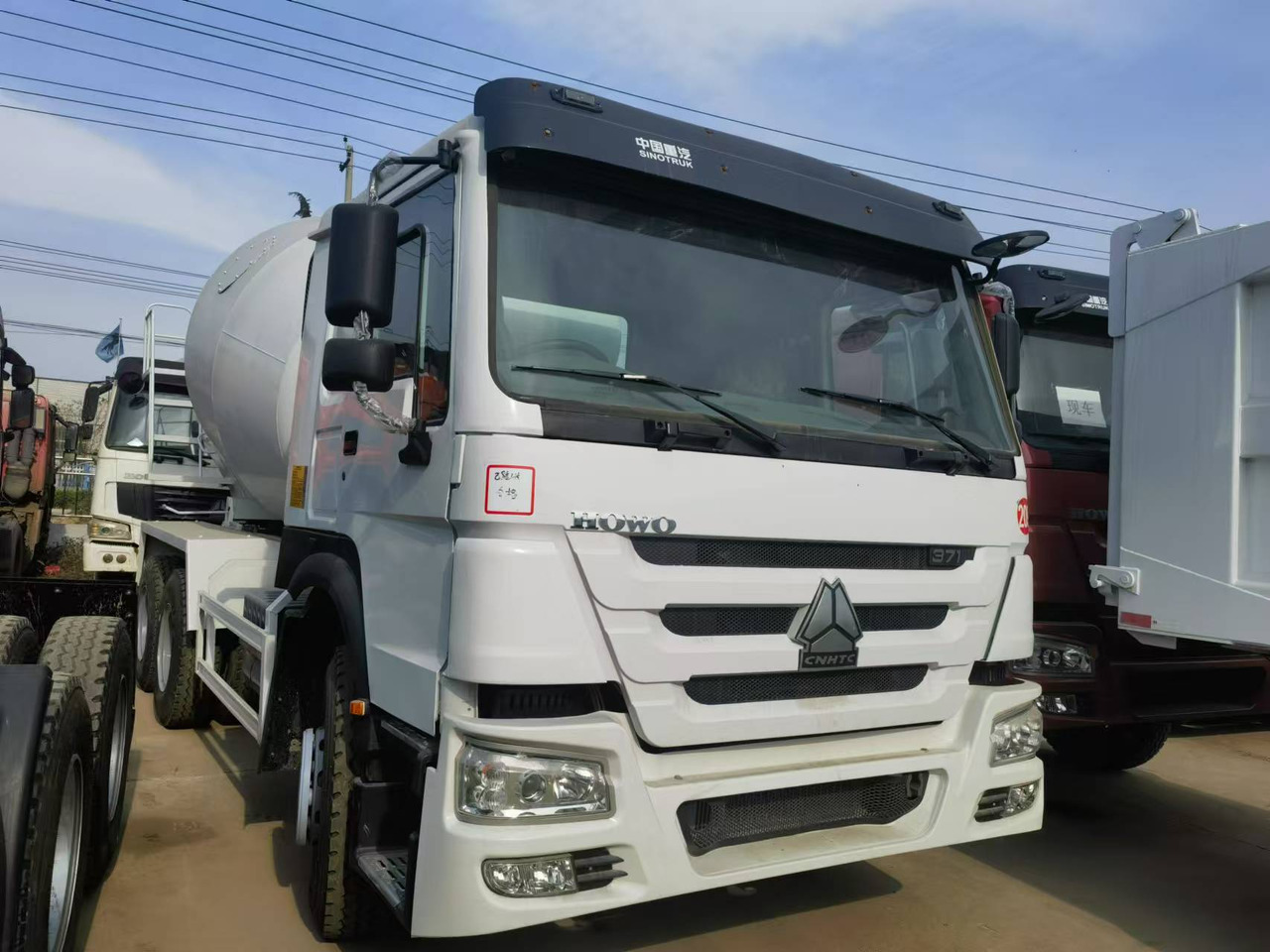 Sinotruk HOWO 371 Concrete mixer truck - Camion malaxeur: photos 1 Sinotruk HOWO 371 Concrete mixer truck - Camion malaxeur: photos 1