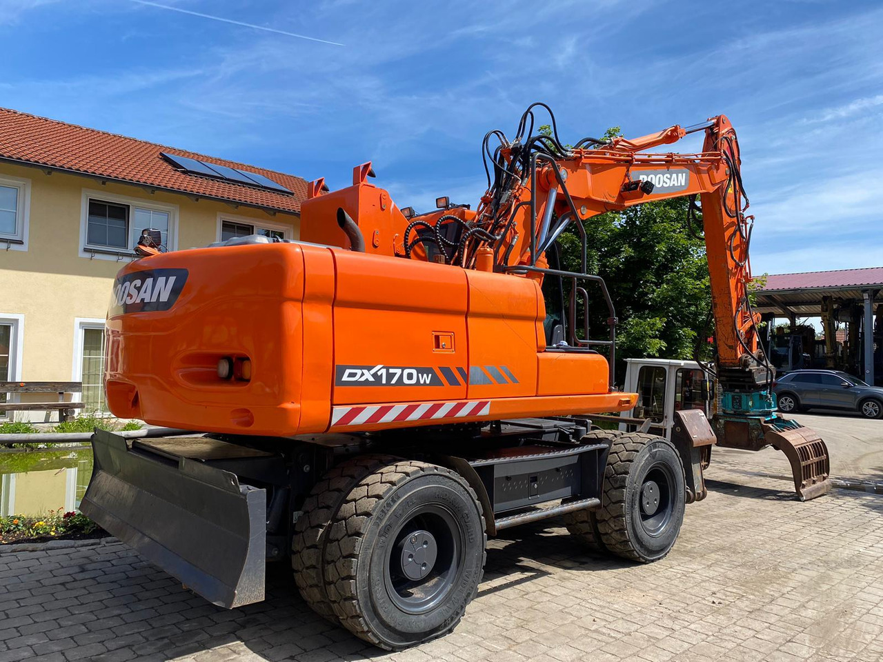 Doosan DX 170 W - Pelle sur pneus: photos 5 Doosan DX 170 W - Pelle sur pneus: photos 5