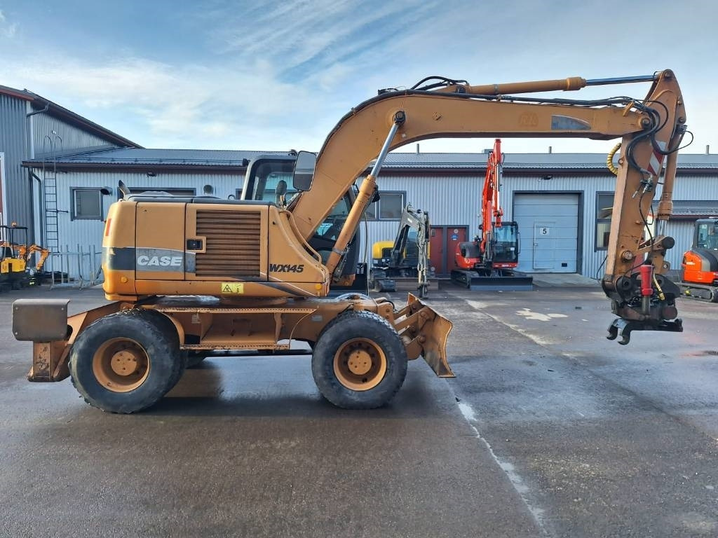 Case WX145 PYÖRITTÄJÄLLÄ - Pelle sur pneus: photos 5 Case WX145 PYÖRITTÄJÄLLÄ - Pelle sur pneus: photos 5