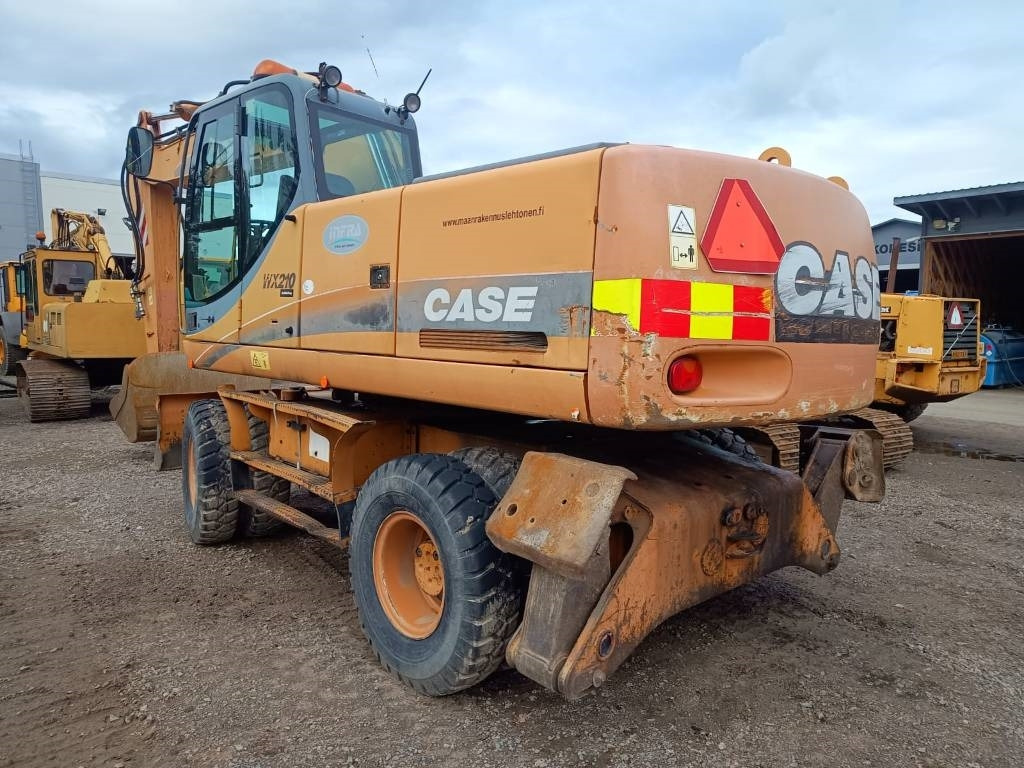 Case WX210 PYÖRITTÄJÄLLÄ - Pelle sur pneus: photos 3 Case WX210 PYÖRITTÄJÄLLÄ - Pelle sur pneus: photos 3