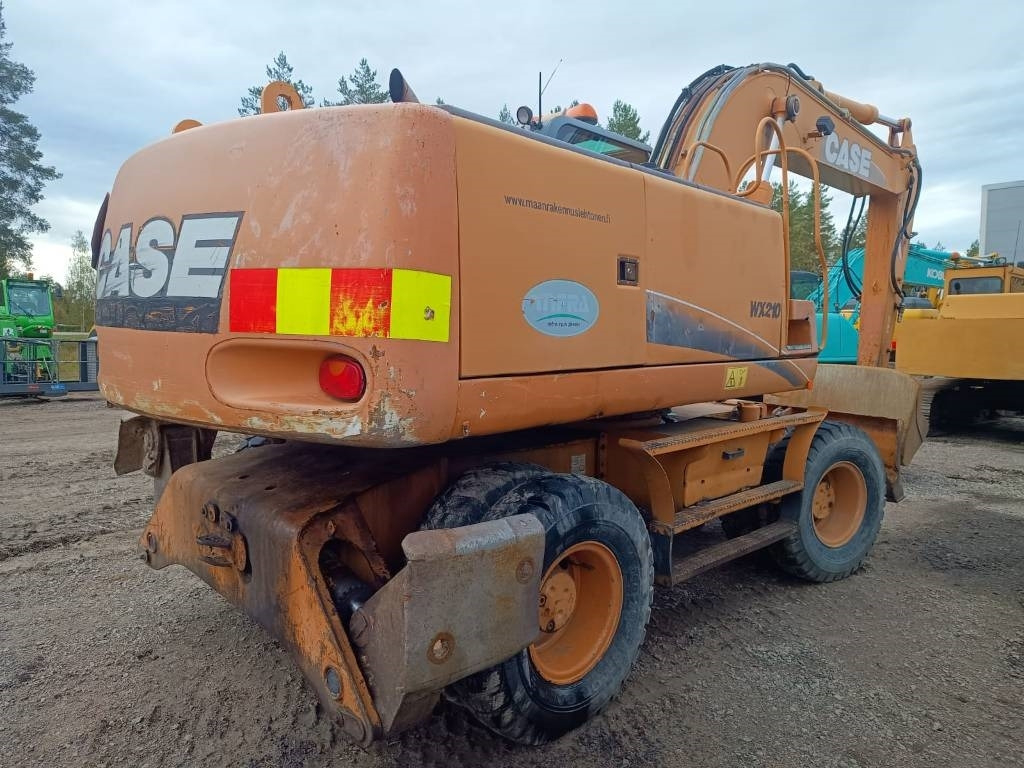 Case WX210 PYÖRITTÄJÄLLÄ - Pelle sur pneus: photos 4 Case WX210 PYÖRITTÄJÄLLÄ - Pelle sur pneus: photos 4