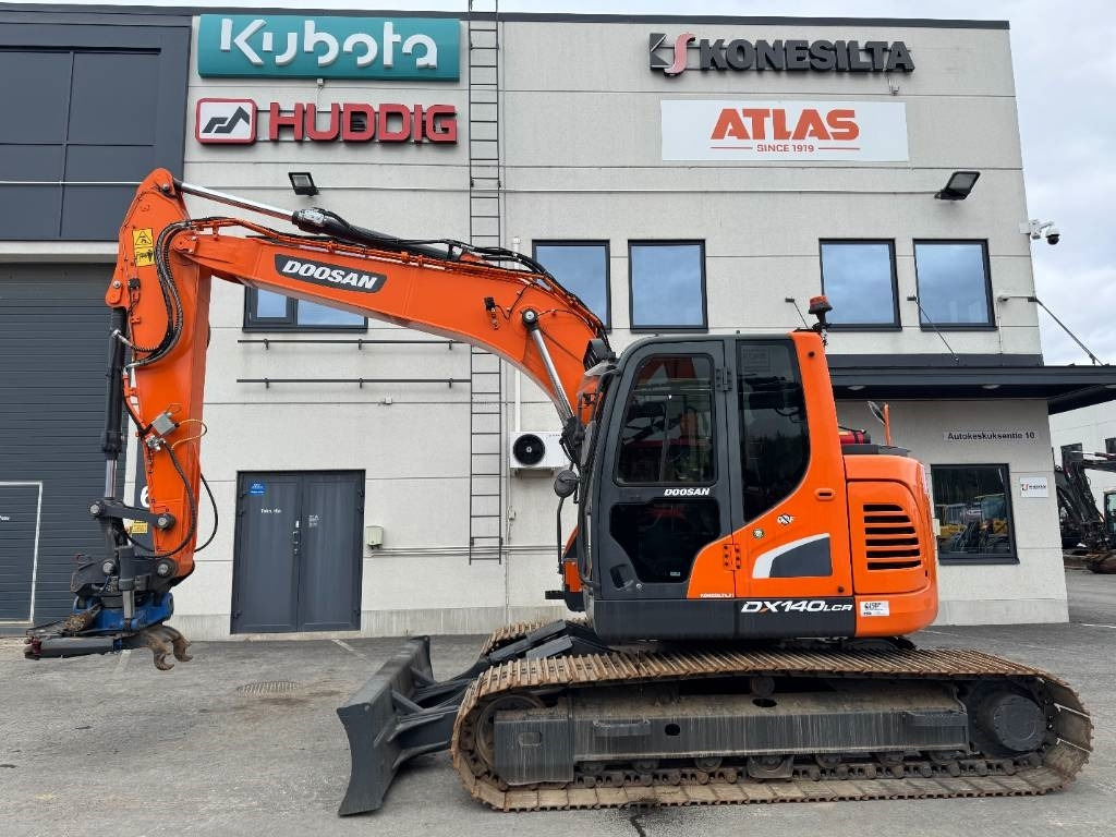 Doosan DX 140 LCR-5 Pyörittäjällä - Pelle sur chenille: photos 1 Doosan DX 140 LCR-5 Pyörittäjällä - Pelle sur chenille: photos 1