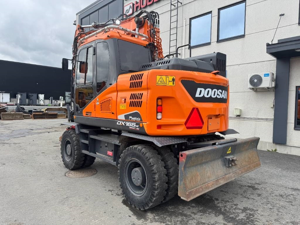 Doosan DX 165 W-5 - Pelle sur pneus: photos 3 Doosan DX 165 W-5 - Pelle sur pneus: photos 3