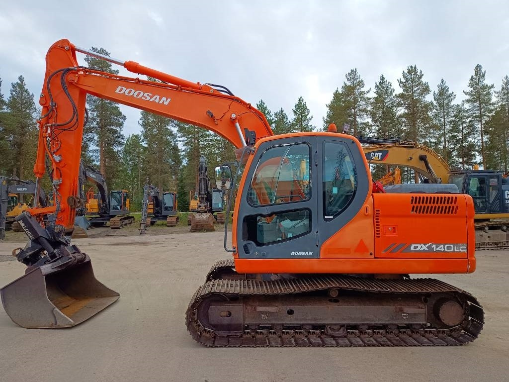 Doosan DX140LC KALLISTAJA+PYÖRITTÄJÄ - Pelle sur chenille: photos 1 Doosan DX140LC KALLISTAJA+PYÖRITTÄJÄ - Pelle sur chenille: photos 1