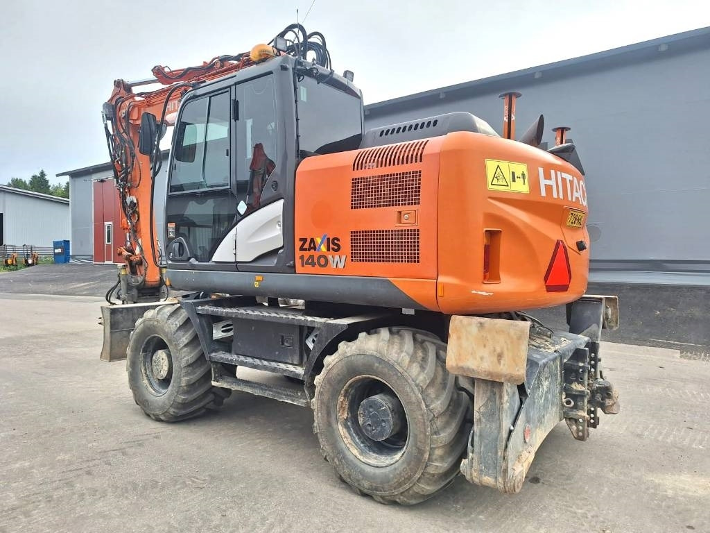 Hitachi ZX140W-5 HUIPPUVARUSTEET - Pelle sur pneus: photos 2 Hitachi ZX140W-5 HUIPPUVARUSTEET - Pelle sur pneus: photos 2