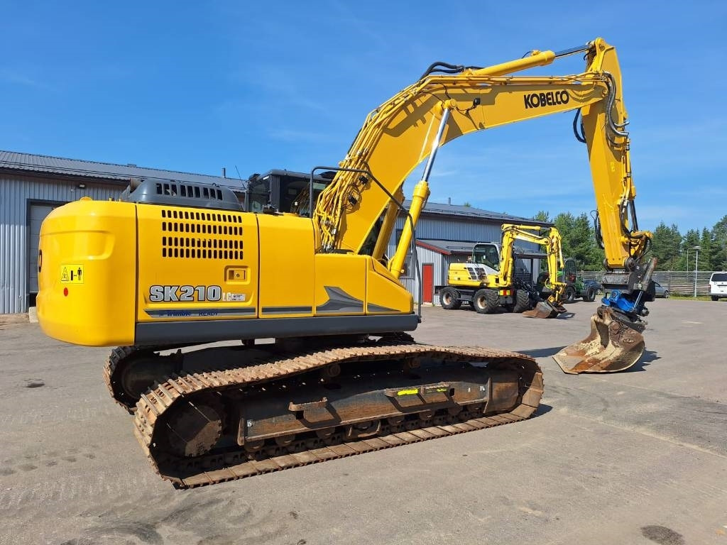 Kobelco SK210LC-11 PYÖRITTÄJÄLLÄ - Pelle sur chenille: photos 4 Kobelco SK210LC-11 PYÖRITTÄJÄLLÄ - Pelle sur chenille: photos 4