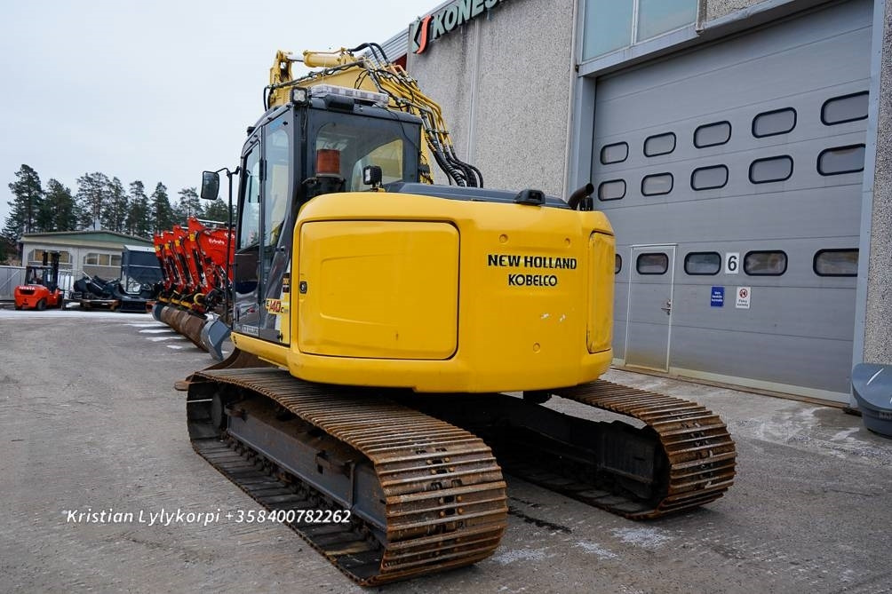 New Holland E140CSR PYÖRITTÄJÄLLÄ - Pelle sur chenille: photos 3 New Holland E140CSR PYÖRITTÄJÄLLÄ - Pelle sur chenille: photos 3