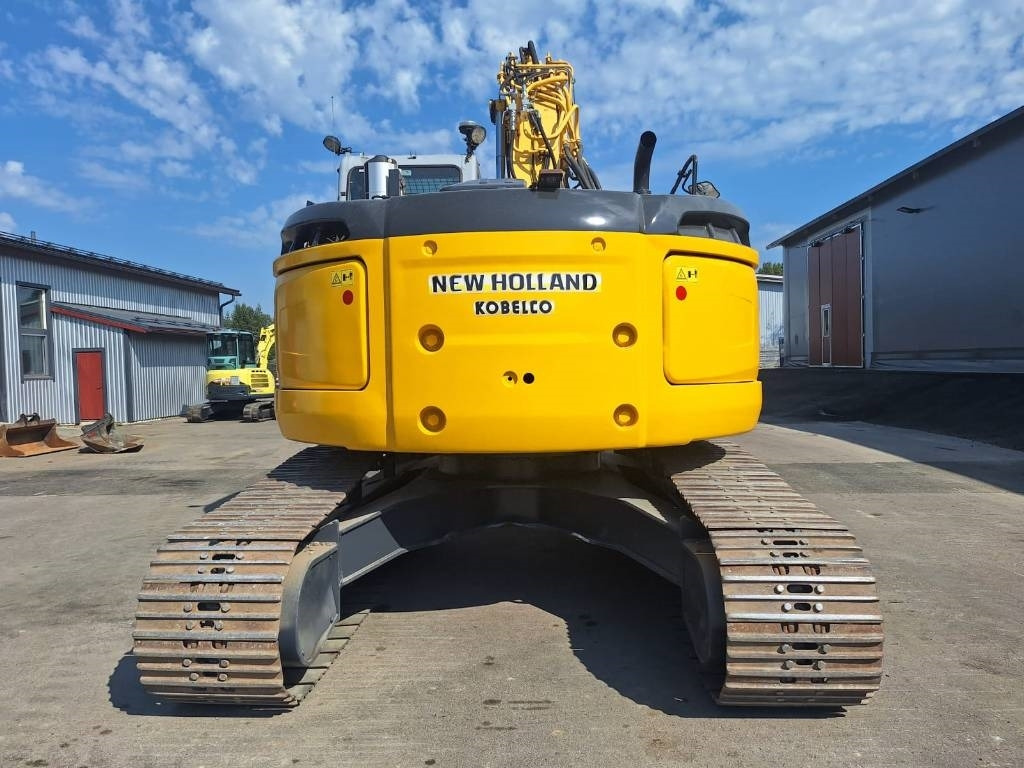 New Holland E235BSRLC PYÖRITTÄJÄLLÄ - Pelle sur chenille: photos 3 New Holland E235BSRLC PYÖRITTÄJÄLLÄ - Pelle sur chenille: photos 3
