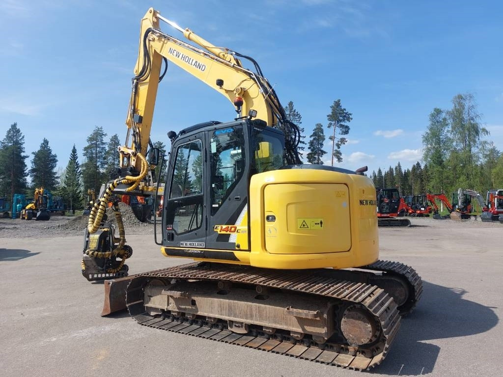 New Holland MYYTY! SOLD! E140CSR MOTO - Pelle sur chenille: photos 3 New Holland MYYTY! SOLD! E140CSR MOTO - Pelle sur chenille: photos 3