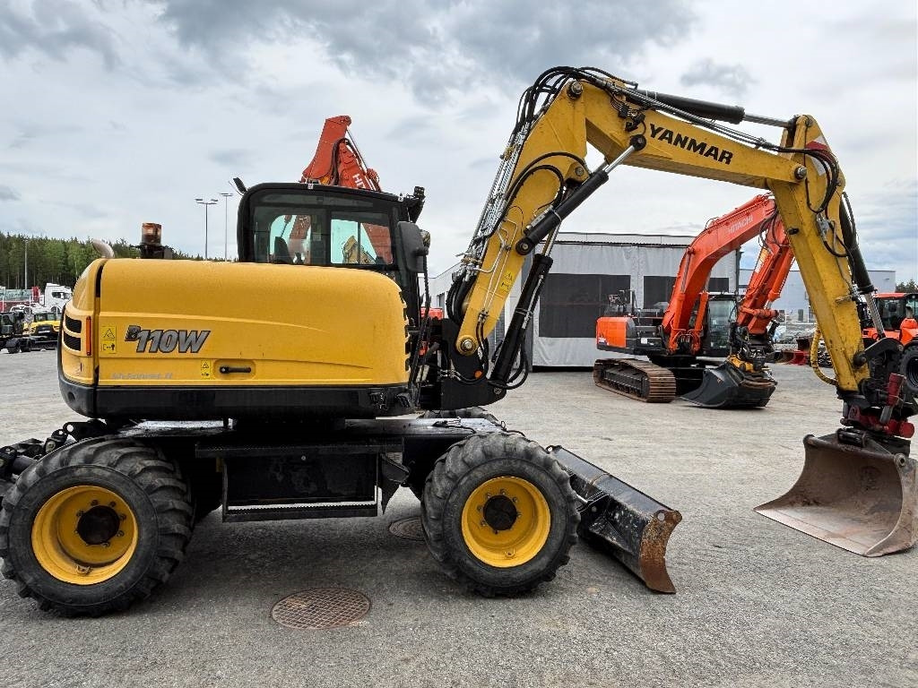 Yanmar B110W PYÖRITTÄJÄLLÄ - Pelle sur pneus: photos 5 Yanmar B110W PYÖRITTÄJÄLLÄ - Pelle sur pneus: photos 5