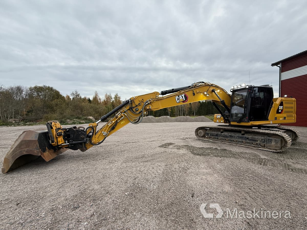 Grävmaskin CAT 323 Next Generation - Pelle sur chenille: photos 1 Grävmaskin CAT 323 Next Generation - Pelle sur chenille: photos 1
