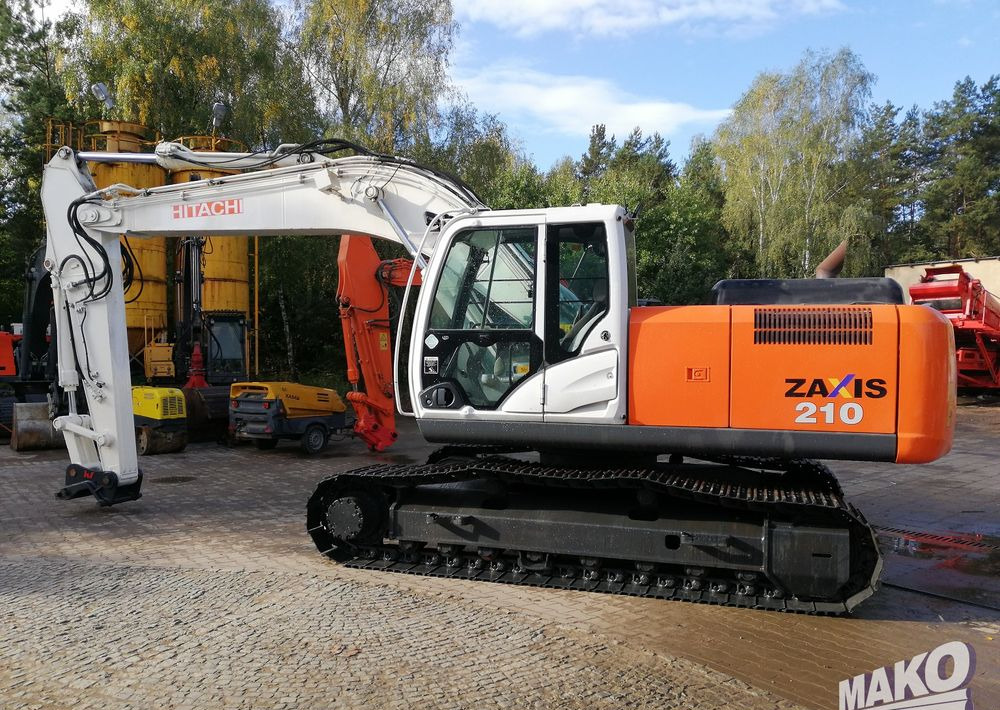 Hitachi ZX210 LC-5B - Pelle sur chenille: photos 2 Hitachi ZX210 LC-5B - Pelle sur chenille: photos 2