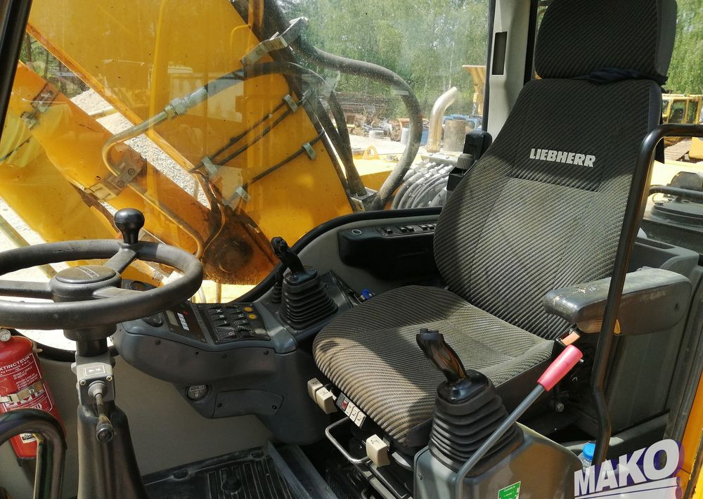 Pelle sur pneus Liebherr A 314 Litronic: photos 8