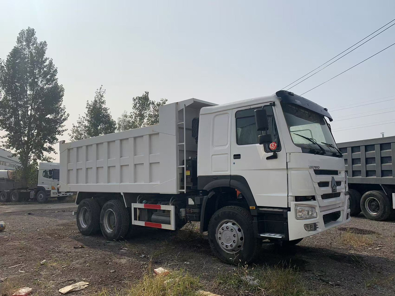 Howo Heavy-Duty 371HP Howo 6×4 Dump Truck 18.5T Payload 14-18m³ U-Shaped Body with ABS - Camion benne: photos 1 Howo Heavy-Duty 371HP Howo 6×4 Dump Truck 18.5T Payload 14-18m³ U-Shaped Body with ABS - Camion benne: photos 1