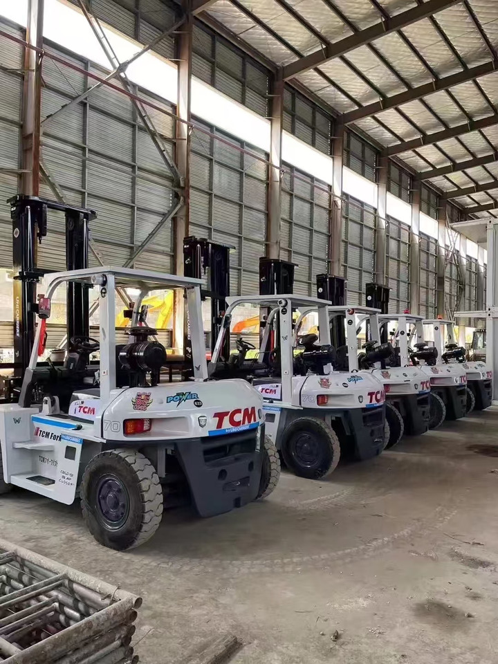 TCM 10 ton Diesel Forklift FD100 with Fork Positioner - Chariot élévateur diesel: photos 1 TCM 10 ton Diesel Forklift FD100 with Fork Positioner - Chariot élévateur diesel: photos 1