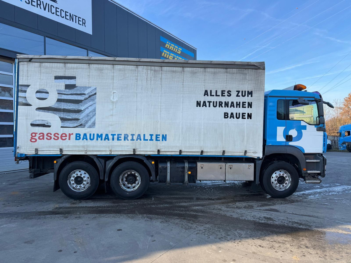 MAN TGA 26.440 6x2 - Camion à rideaux coulissants: photos 4 MAN TGA 26.440 6x2 - Camion à rideaux coulissants: photos 4