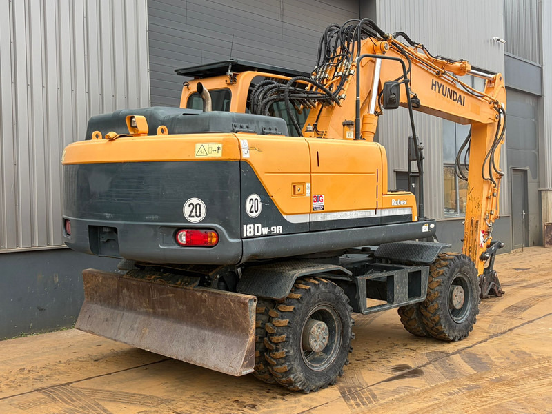 Hyundai Robex 180W-9A - Pelle sur pneus: photos 5 Hyundai Robex 180W-9A - Pelle sur pneus: photos 5