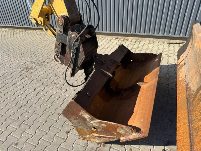 Pelle sur pneus Caterpillar M 316 C: photos 15