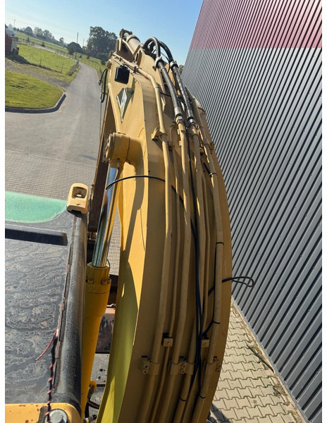 Pelle sur pneus Caterpillar M 316 C: photos 18