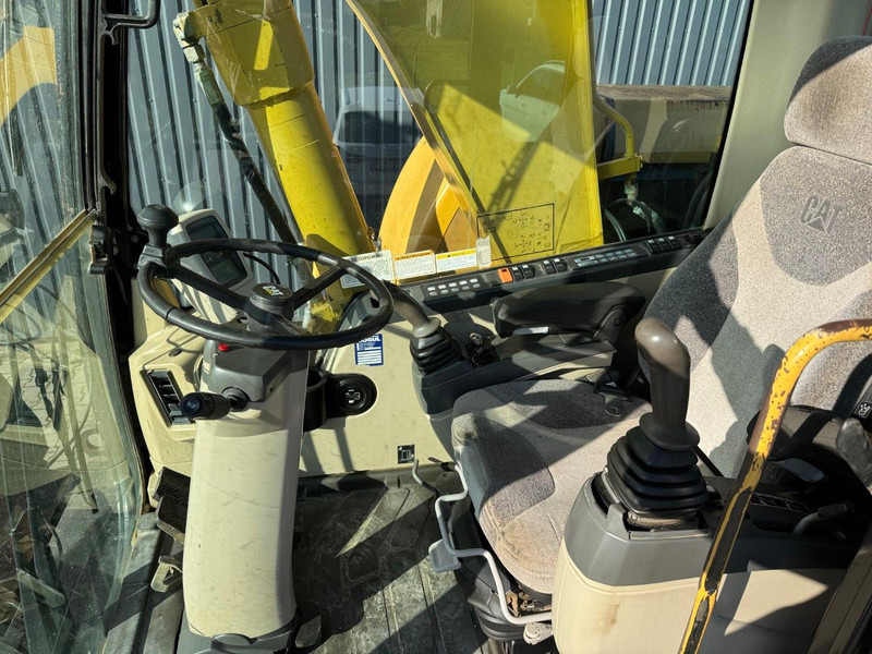 Pelle sur pneus Caterpillar M 316 C: photos 6