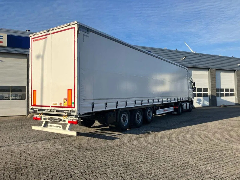 Kässbohrer SCS X / 90 - 12 / 27 Schuifzeilen met twee liftassen en hefdak 500mm - Semi-remorque rideaux coulissants: photos 5 Kässbohrer SCS X / 90 - 12 / 27 Schuifzeilen met twee liftassen en hefdak 500mm - Semi-remorque rideaux coulissants: photos 5